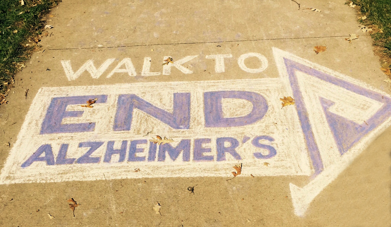 Walk to End Alzheimer's written in sidewalk chalk