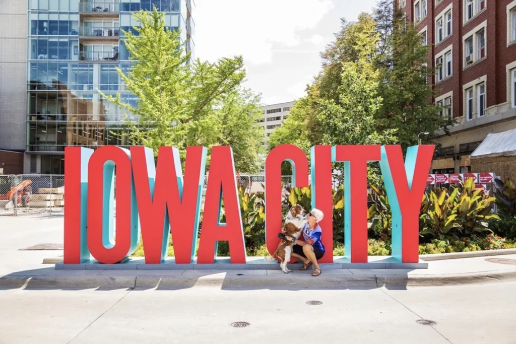 Red Iowa City sign in downtown Iowa City, Iowa