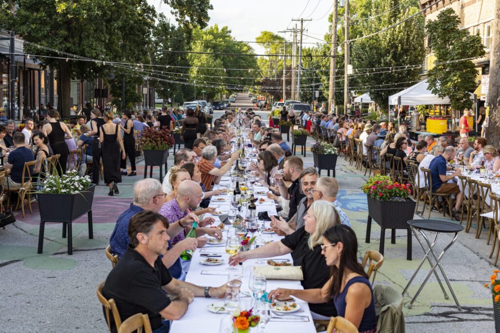 Diners enjoying a meal during the Farm to Street Dinner in Iowa City