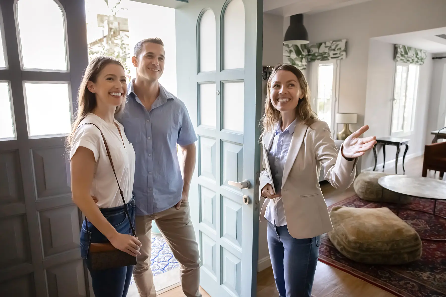 Young couple going through the process of how to choose a REALTOR