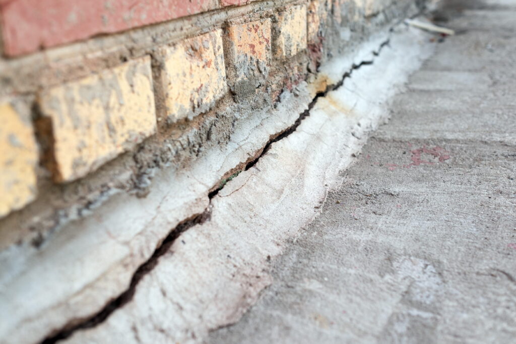 Crack in the foundation of a brick home