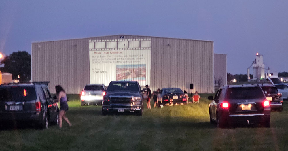 Cars parked at the Iowa City Municipal Airport for Drive-In Movies at the Hangar 