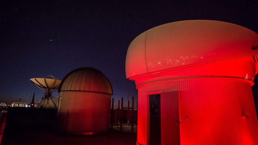 People sky gazing at the Van Allen Observatory on the University of Iowa Campus in Iowa City, Iowa