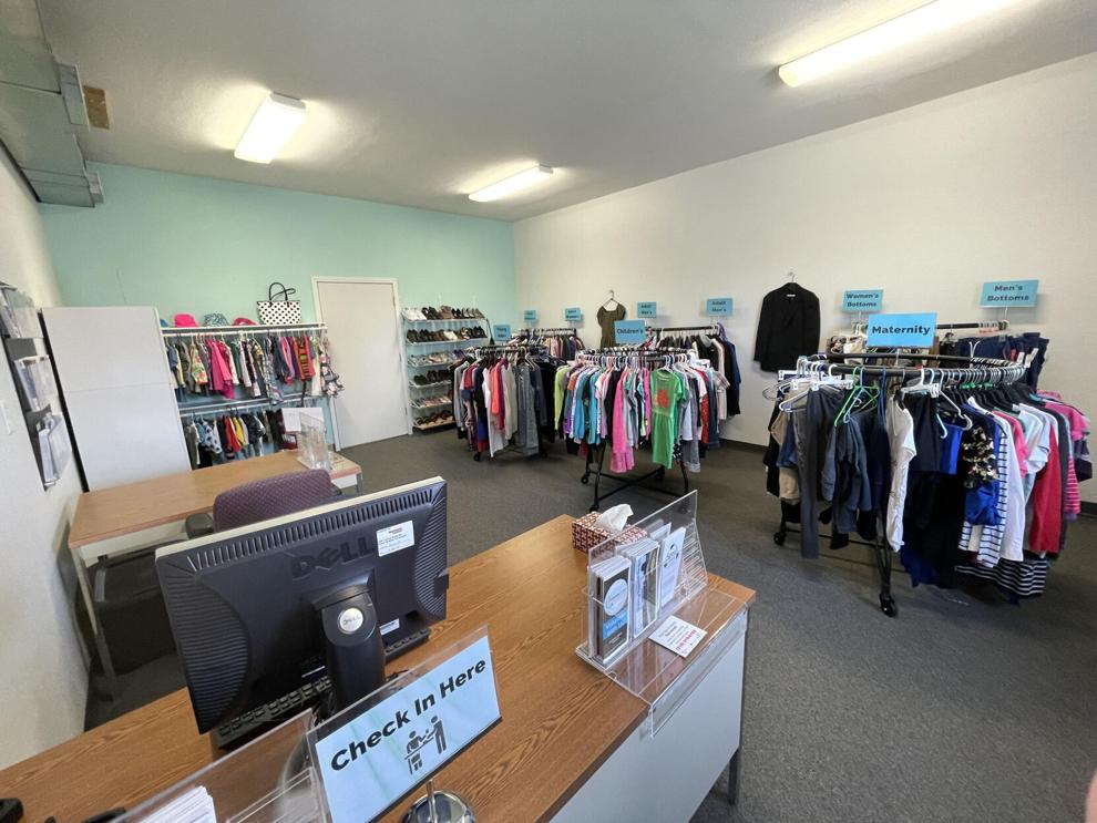 Racks of used closing available at the North Liberty Community Pantry