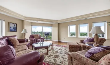 Living room with incredible views of the Brucemore Mansion & park-like grounds.