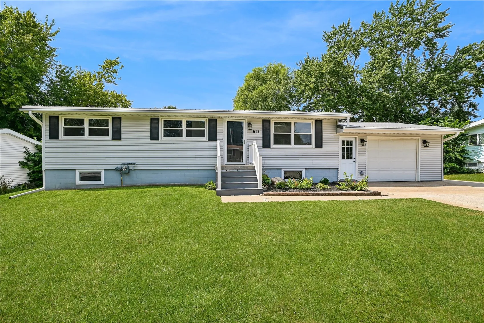 1512 Rainbow Drive, Belle Plaine, Iowa 52208 – Property Featured Image