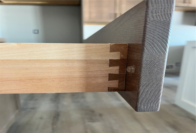 Solid wood, dovetail drawers.