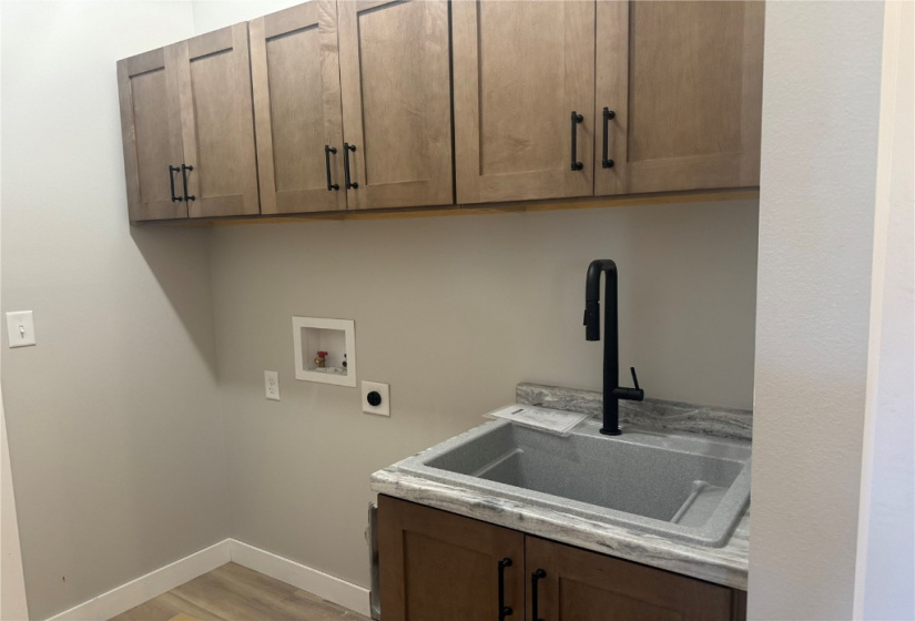 Main floor laundry with sink