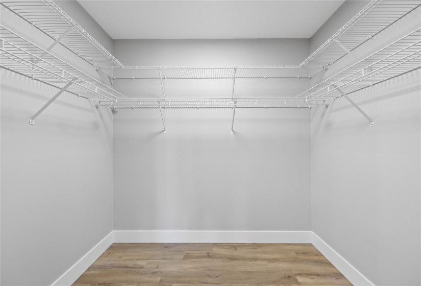 Walk in Primary Closet*Photos are of a similar home.