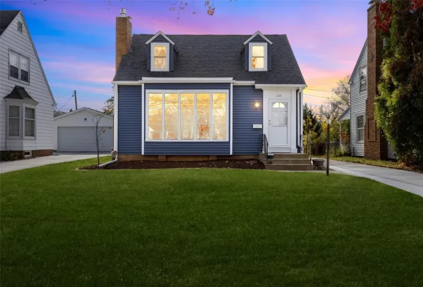 Dusk pic and new concrete driveway