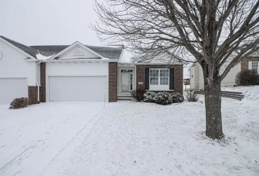 Front of property - before the snow was 
 removed through HOA Association!