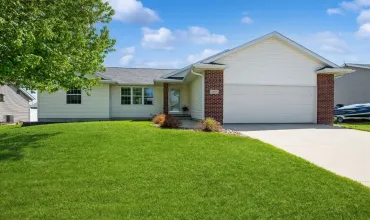 Vinyl siding w/ brick accents