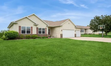 Basketball area on right side of  driveway